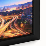 Close-up of a framed landscape canvas featuring a serene bridge over water, showcasing vibrant colors and intricate details, perfect for home decor.