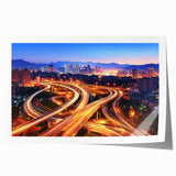 Rolled landscape bridge print showcasing intricate details and vibrant colors, elegantly packaged in a protective cardboard tube, ideal for home decor.