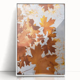 Framed acrylic print featuring an art deco style depiction of autumn with muted orange and brown tones.
