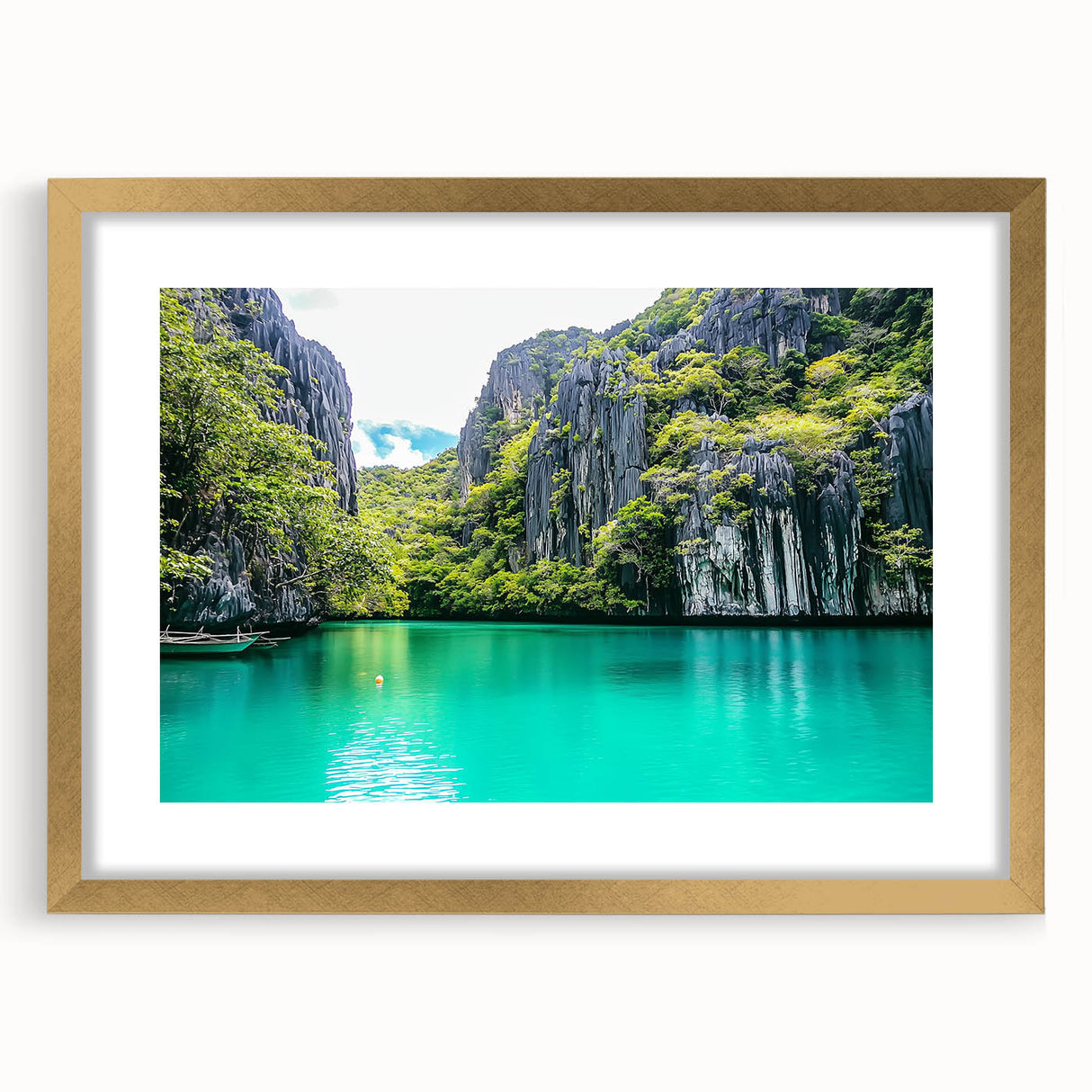 Framed landscape artwork featuring dramatic cliffs and vibrant colors, elegantly presented with a gold mat, enhancing the visual appeal for home decor.