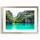 Framed landscape artwork showcasing dramatic cliffs with a silver mat border, perfect for enhancing modern home decor. Ideal for nature enthusiasts and art lovers.