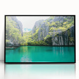 Framed acrylic artwork showcasing a breathtaking landscape of dramatic cliffs, presented in a sleek black frame, perfect for modern home decor. Ideal for nature lovers and art enthusiasts.