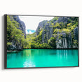 Framed canvas artwork depicting a stunning landscape of cliffs, showcasing intricate details and vibrant colors, presented in a sleek black frame. Ideal for enhancing modern home decor.