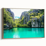 Framed canvas artwork showcasing a breathtaking landscape of cliffs, with a gold frame accentuating the vibrant colors and textures, perfect for home decor.
