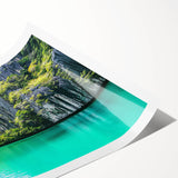 Vibrant landscape print showcasing dramatic cliffs and lush greenery, rolled and securely packaged in a protective cardboard tube for easy transport and display.