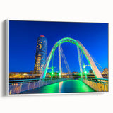 Framed canvas artwork depicting a serene landscape with a bridge, showcasing vibrant colors and intricate details, ideal for home decor and art enthusiasts.