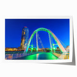 Rolled canvas print showcasing a stunning landscape bridge design with intricate details and vibrant colors, securely packaged in a protective tube for easy transport.