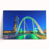 Stunning landscape canvas print of a serene bridge scene, showcasing vibrant greens and a tranquil waterway, perfect for home decor or office settings.