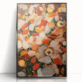 Mid-century modernist art depicting autumn trees in orange and red tones on a silver-framed acrylic print.