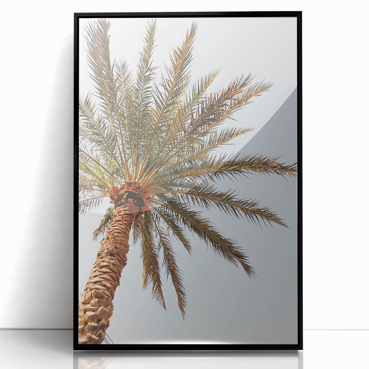 Large abstract wall art in vibrant orange and yellow hues on black framed acrylic, ideal for modern living room decor.