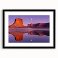 Framed landscape artwork showcasing dramatic cliffs with a black matting, highlighting the natural beauty and textures of the scene, perfect for home decor.