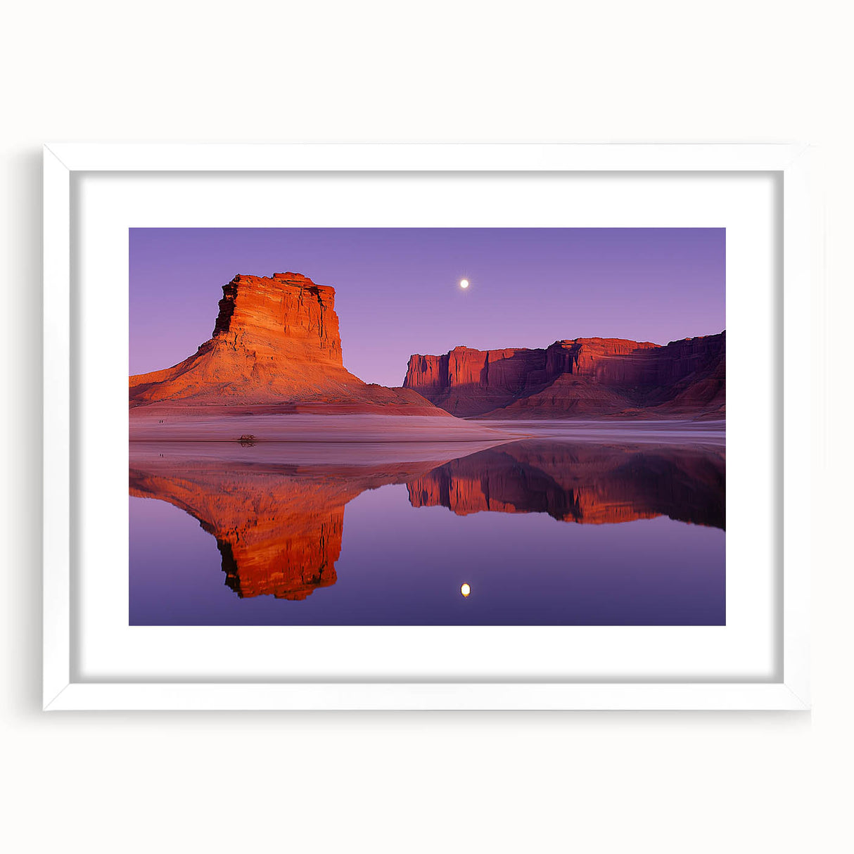 Framed landscape artwork depicting rugged cliffs under a bright blue sky, with a white mat enhancing its elegance, perfect for home decor.