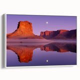 Framed canvas artwork depicting a scenic landscape with dramatic cliffs and a serene background, showcasing vibrant colors and textures, ideal for home decor.