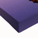 Close-up of a stretched canvas artwork depicting dramatic cliffs and lush landscapes, showcasing vibrant colors and intricate details, ideal for home decor.