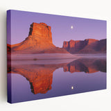 Stretched canvas artwork depicting a breathtaking landscape with dramatic cliffs, vibrant colors, and intricate details, perfect for enhancing home décor.