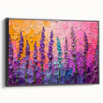 Framed canvas wall art showcasing an abstract floral design in vibrant colors, with a sleek black frame, elegantly displayed from the side to highlight its modern aesthetic.