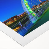 Rolled canvas artwork showcasing a vibrant landscape bridge design, featuring rich colors and intricate details, packaged securely in a durable cardboard tube.