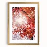 Abstract art print featuring textured fall colors on a large canvas, framed in gold, ideal for living room decor.