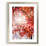 Textured abstract art print in warm autumn hues on a silver-framed mat, suitable for bedroom decor.