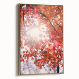 Framed canvas featuring a vintage-style landscape painting of an autumn scene, with golden and black tones.