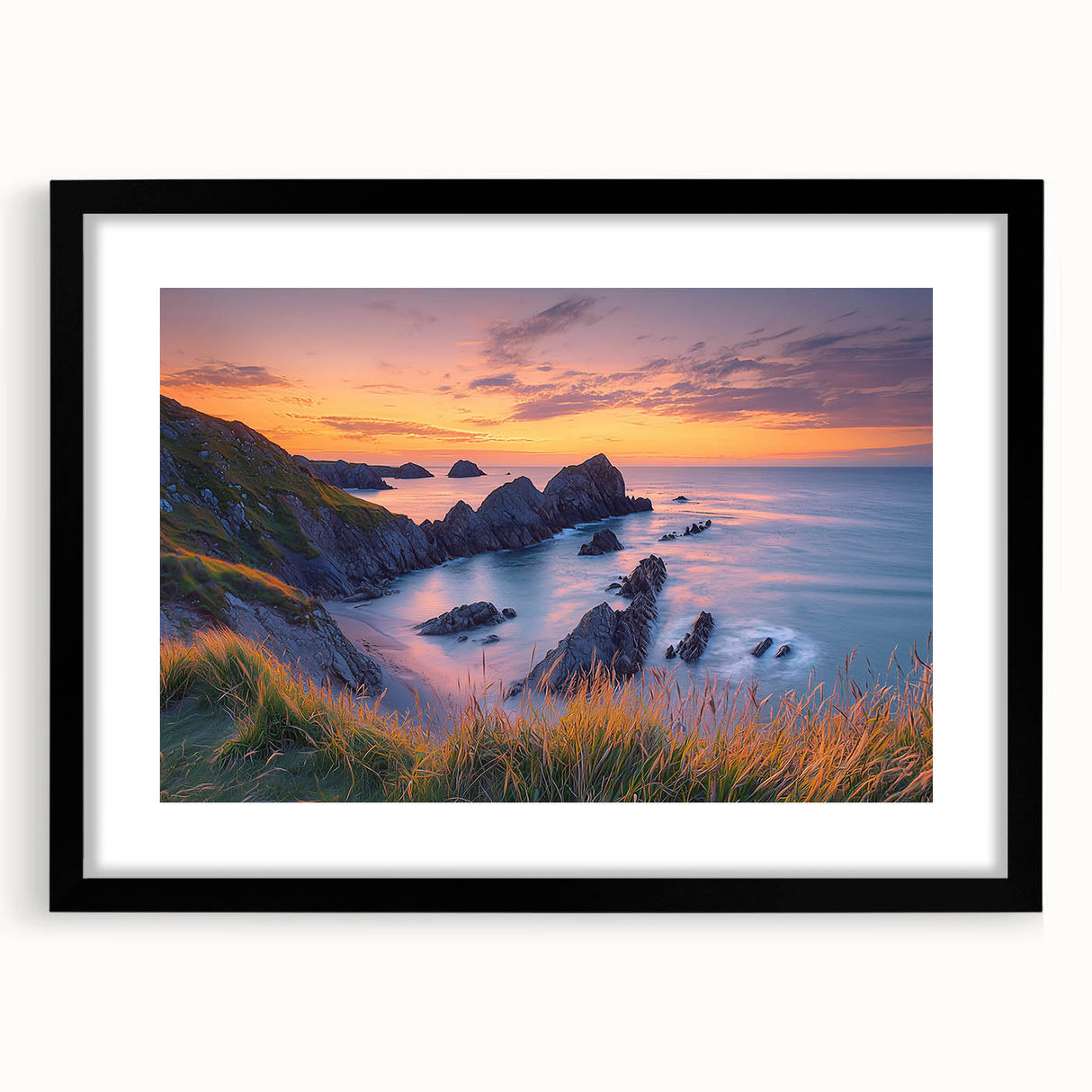 Black-framed landscape art print showcasing dramatic cliffs against a vibrant sunset background, perfect for enhancing modern home decor with natural beauty.
