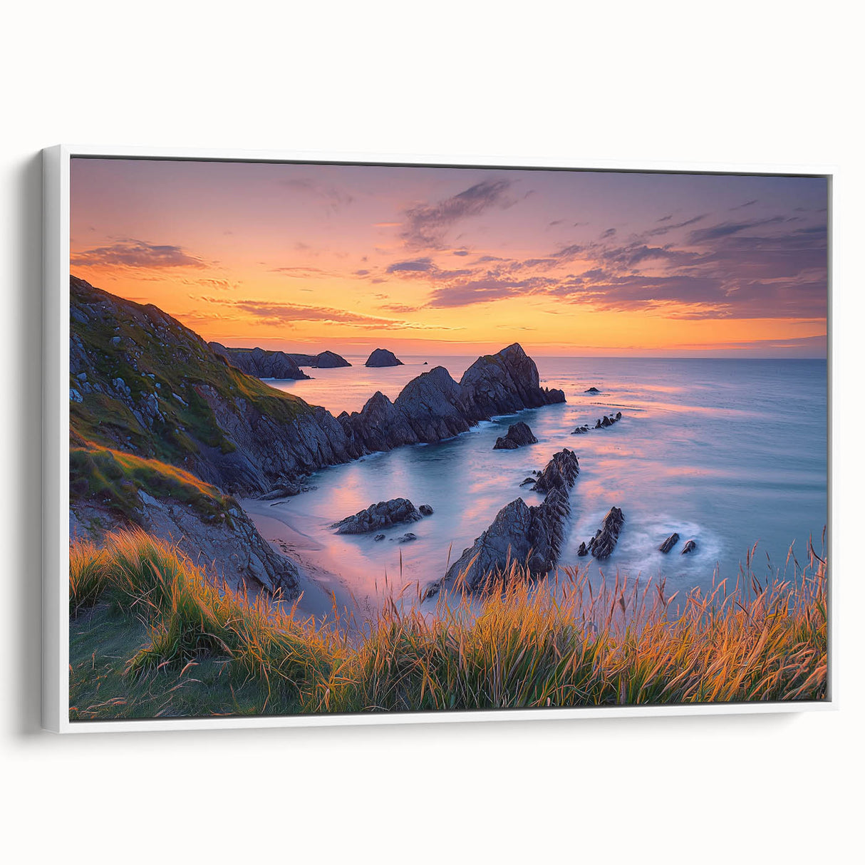 Framed canvas artwork depicting dramatic cliffs and serene landscapes in muted tones, showcasing a white frame, perfect for enhancing modern home decor.