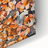 Large abstract wall art depicting fall trees in orange and brown hues on acrylic glass, suitable for dining room ambiance.