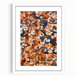 Abstract art print depicting swirling autumn hues in red and orange on a white framed canvas, suitable for dining room decor.