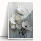 Framed abstract floral wall art featuring vibrant colors and intricate designs, displayed in a sleek white frame, perfect for modern home decor.
