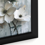 Close-up of framed abstract floral wall art on canvas, featuring vibrant colors like pink, blue, and green. Ideal for modern home decor or artistic spaces.