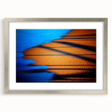 Abstract landscape wall art framed in silver with a mat border, showcasing vibrant colors and unique shapes, perfect for modern home decor.