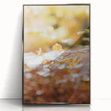 Mid-century modernist art depicting autumn trees in orange and brown hues on a silver-framed acrylic print.