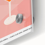 Large abstract wall art in vibrant hues of red and orange on acrylic glass, suitable for dining room ambiance.