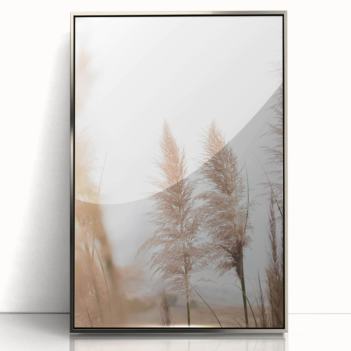 Mid-century modernist art featuring abstract summer themes in vibrant orange and yellow on a silver-framed acrylic print.