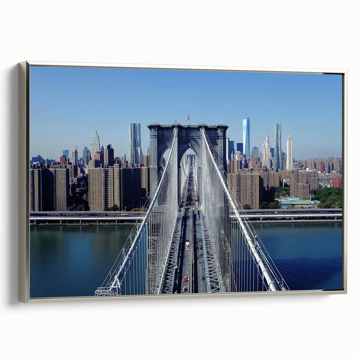 Framed landscape canvas art depicting a serene bridge scene, featuring silver accents, mounted on a wall, ideal for home decor and aesthetic enhancement.