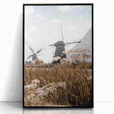 Large abstract wall art featuring autumnal colors on a black framed acrylic, suitable for modern living room decor.