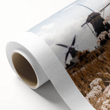 Art deco poster of a fall season landscape on rolled canvas, featuring warm orange and brown hues.