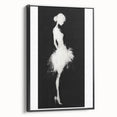 Framed abstract figurative canvas art in black, showcasing modern design elements with a sleek side view, perfect for contemporary home decor and styling.