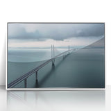 Framed acrylic artwork of a serene landscape featuring a bridge surrounded by lush greenery, displayed in a white frame, ideal for home or office decor.