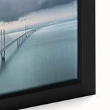 Close-up of a framed canvas print showcasing a serene landscape bridge scene with vibrant colors and intricate details, ideal for home decor enhancement.