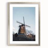 Textured art depicting abstract fall foliage in earthy tones on a framed silver canvas, suitable for bedroom decor.