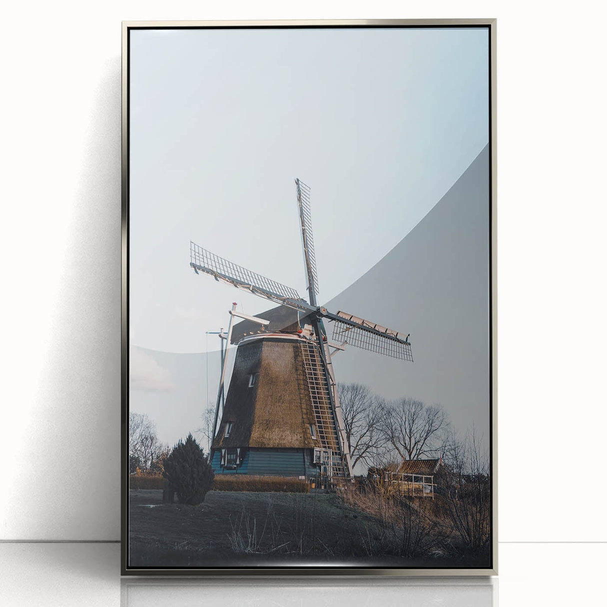 Mid-century modernist art depicting autumn trees in orange and red hues on a silver-framed acrylic print.