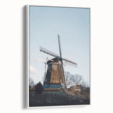 Vintage poster art of an autumnal scene in muted orange and brown tones, framed canvas, ideal for living room decor.