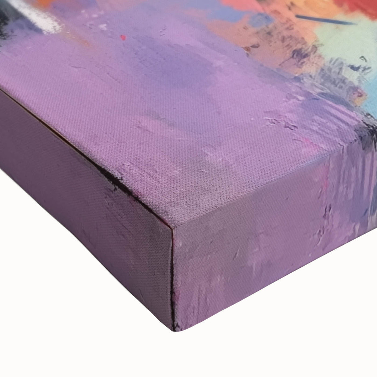 Close-up view of an abstract geometric stretched canvas artwork, showcasing vibrant colors and intricate patterns, perfect for modern home decor.