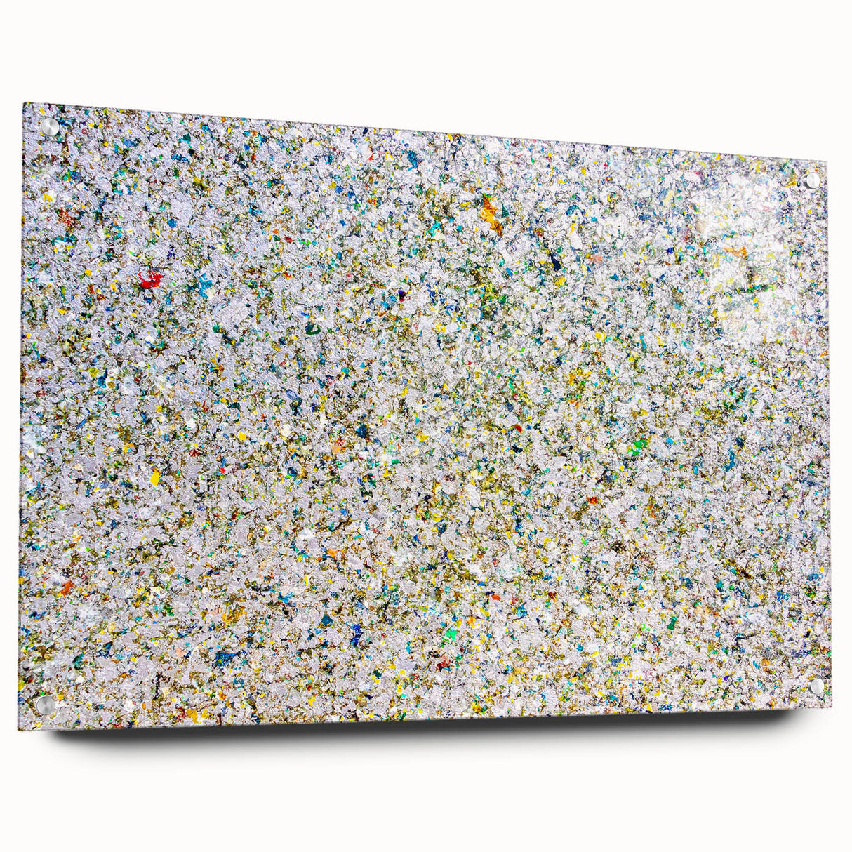 Abstract acrylic art print showcasing vibrant splatters in bold colors, displayed in a sleek glass frame with pins for mounting. Ideal for modern home decor.