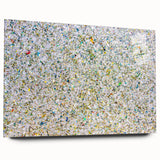 Abstract acrylic glass artwork showcasing vibrant splatters in various colors, viewed from the side. This unique design adds a modern touch to any space, perfect for contemporary decor.