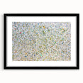 Abstract splatter art frame in black, showcasing vibrant colors against a mat background, perfect for modern home decor and artistic displays.