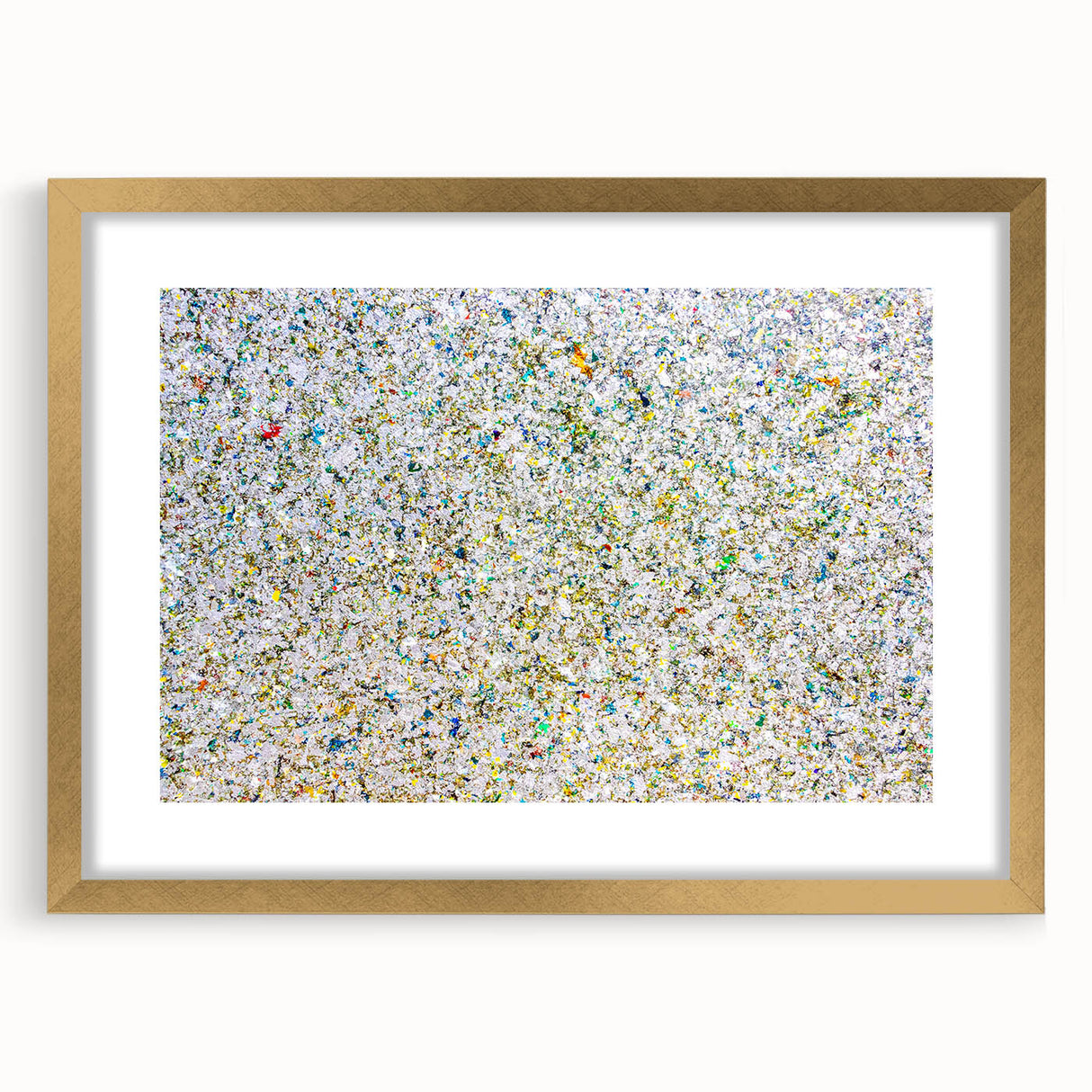 Abstract splatter art frame with a gold mat, showcasing vibrant colors and dynamic shapes, ideal for modern decor and artistic home styling.
