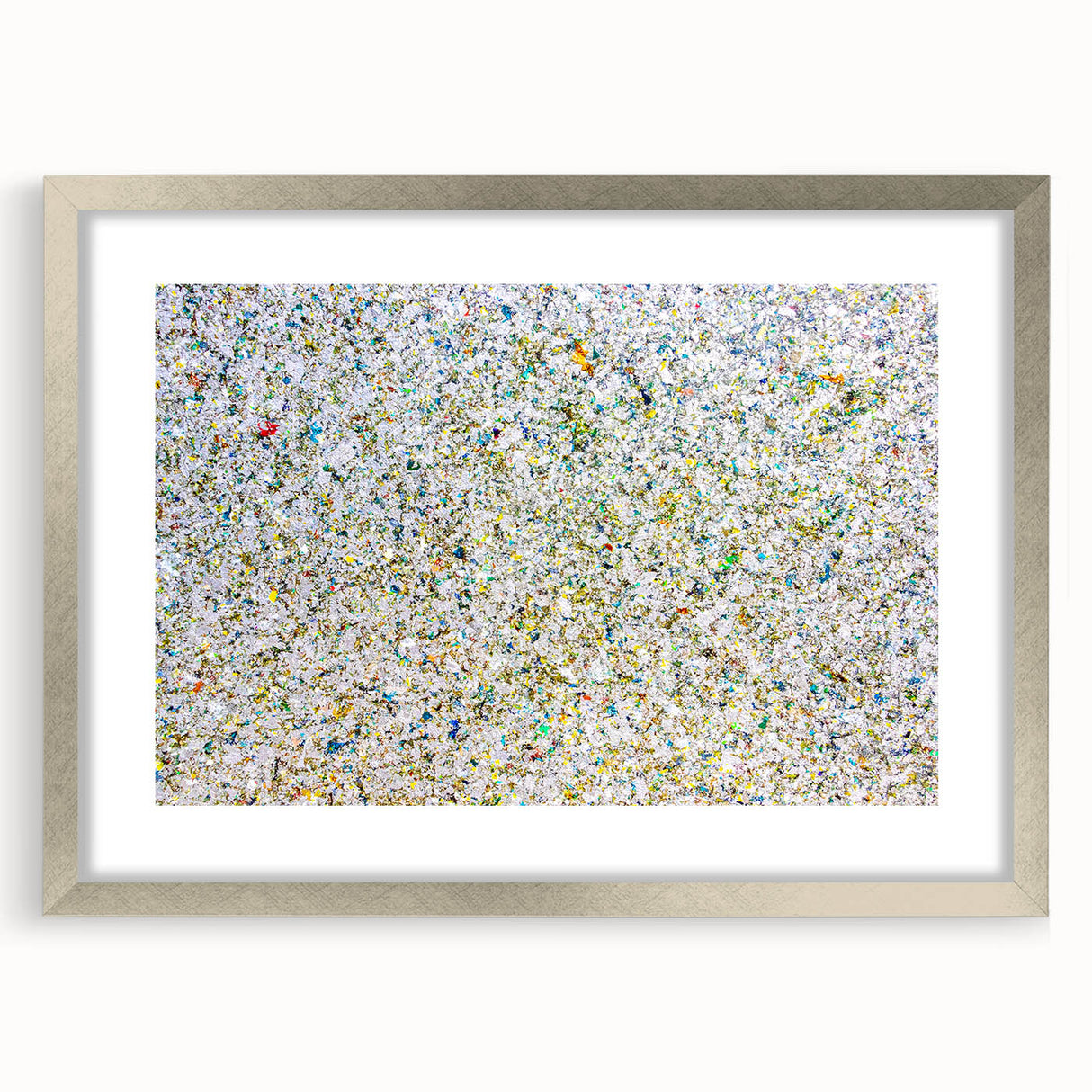 Abstract splatter frame with a silver mat, showcasing vibrant colors and artistic designs, perfect for modern home decor or gallery displays.