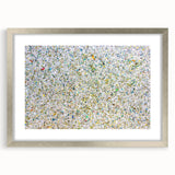 Abstract splatter frame with a silver mat, showcasing vibrant colors and artistic designs, perfect for modern home decor or gallery displays.